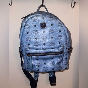 blue MCM backpack with studs